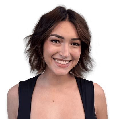Portrait of Syd, a professional stylist at Headlines The Salon, showcasing their expertise and style.