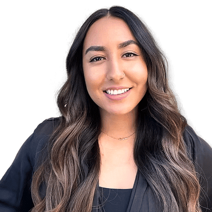Portrait of Andrea, a professional stylist at Headlines The Salon, showcasing their expertise and style.