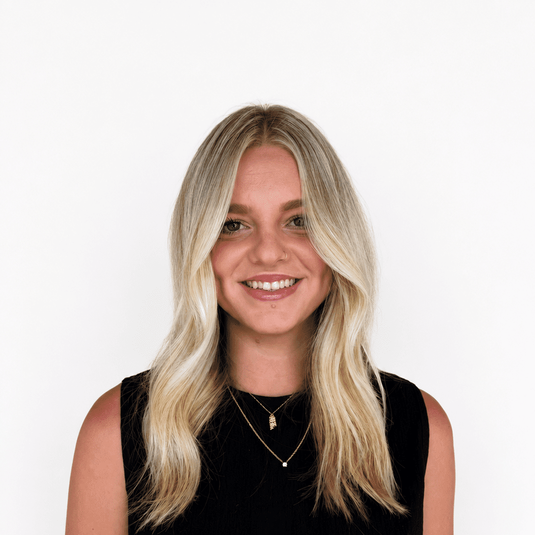 Portrait of Sage, a professional stylist at Headlines The Salon, showcasing their expertise and style.