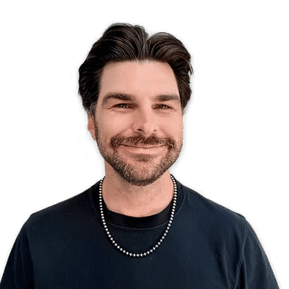 Portrait of Connor, a professional stylist at Headlines The Salon, showcasing their expertise and style.