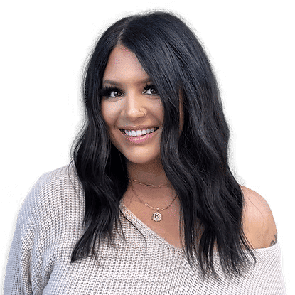 Portrait of Kori, a professional stylist at Headlines The Salon, showcasing their expertise and style.