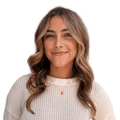Portrait of Savannah, a professional stylist at Headlines The Salon, showcasing their expertise and style.