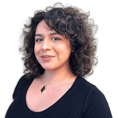 Portrait of Emily B, a professional stylist at Headlines The Salon, showcasing their expertise and style.